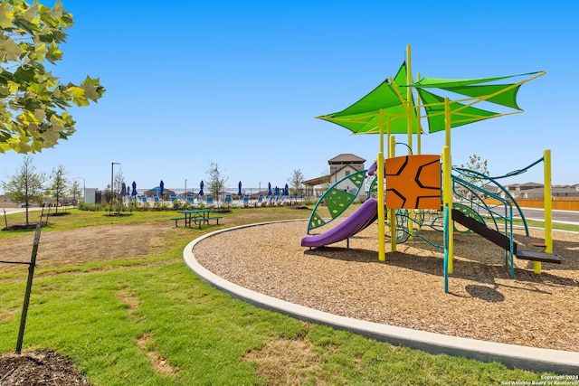 view of play area with a lawn