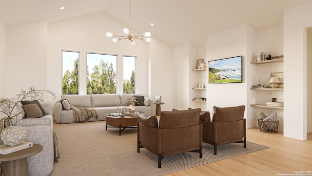 living room featuring a notable chandelier, light hardwood / wood-style floors, and high vaulted ceiling