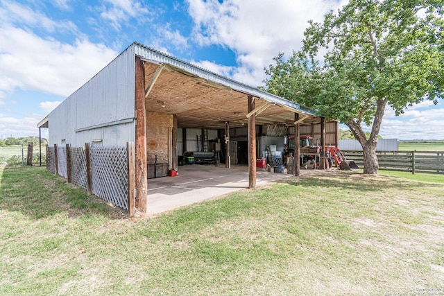 view of outdoor structure with a yard