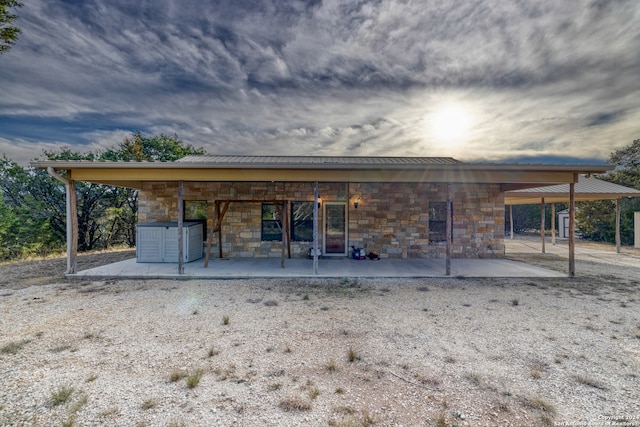 back of property featuring a patio