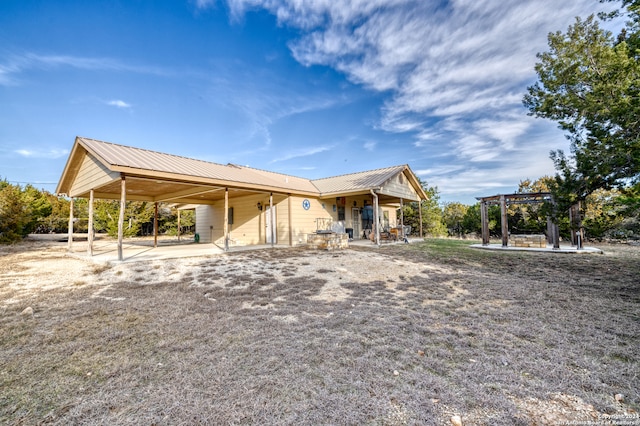 exterior space with a patio and a pergola