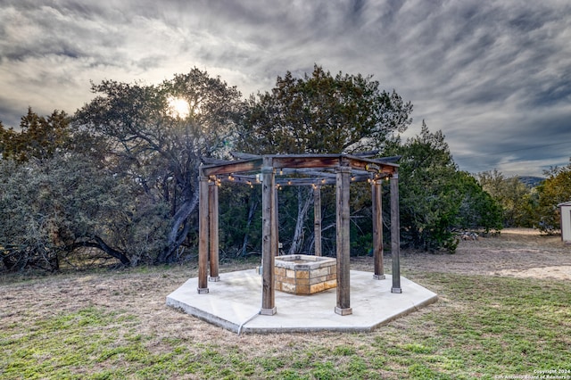 view of yard with a fire pit and a patio area