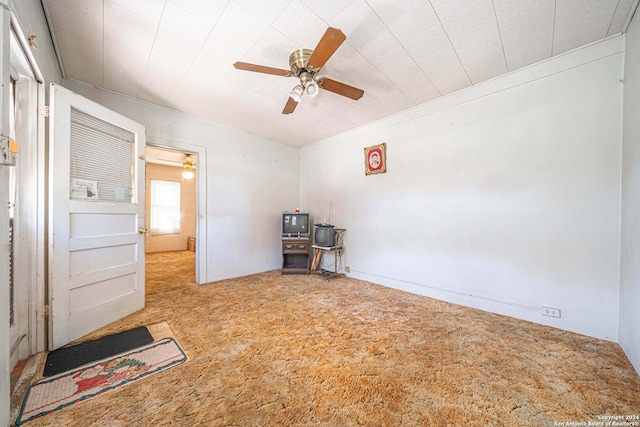 empty room with carpet and ceiling fan