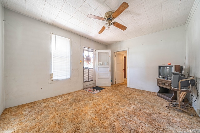 interior space featuring ceiling fan