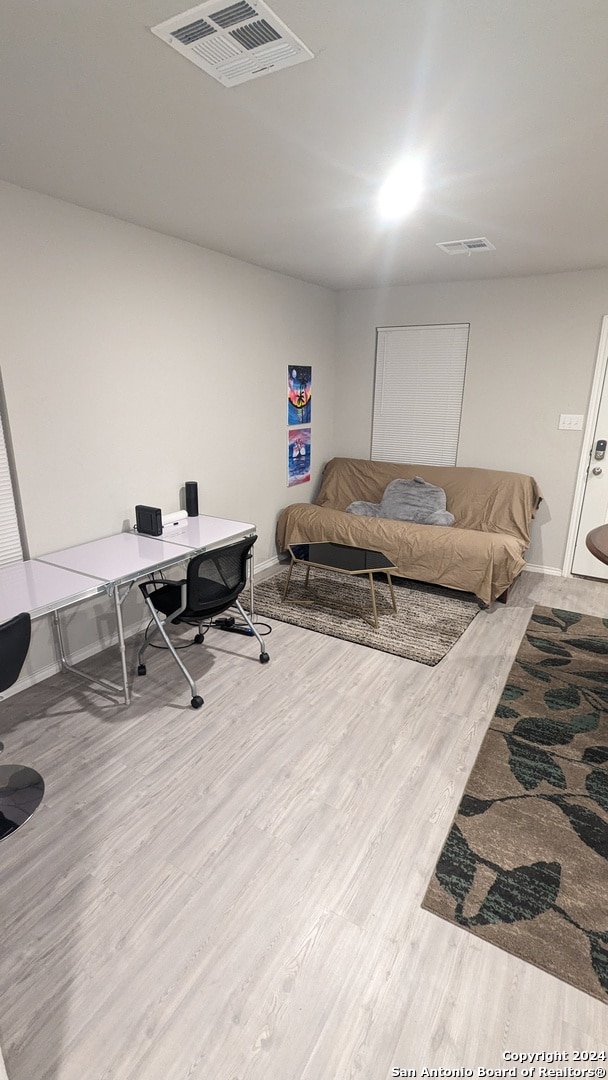 living room with hardwood / wood-style flooring