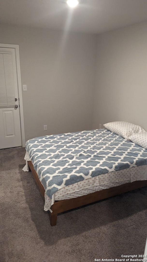 bedroom featuring carpet flooring