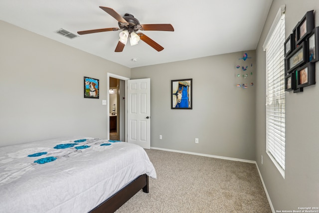 bedroom featuring ceiling fan and carpet floors