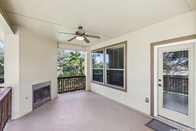 view of patio featuring ceiling fan