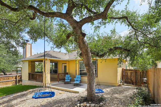 back of house featuring a patio