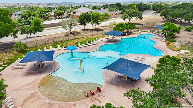 view of swimming pool featuring a patio area