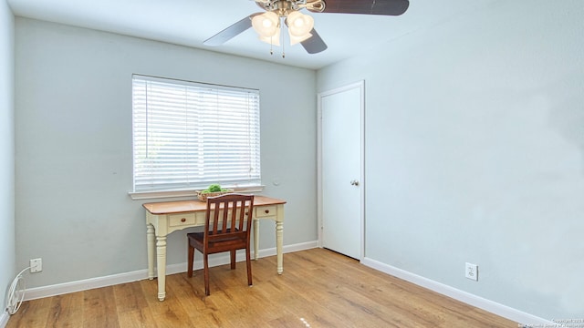 interior space with light hardwood / wood-style flooring and ceiling fan