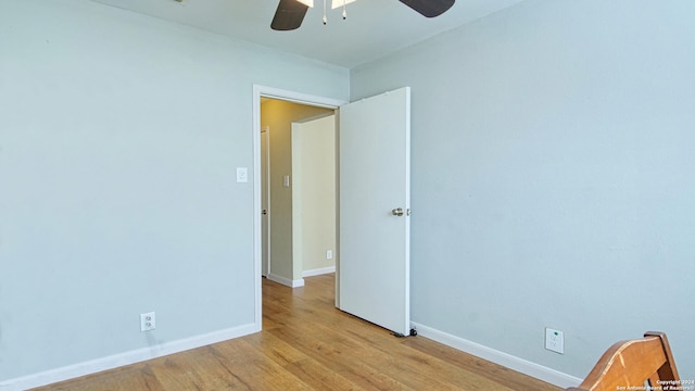 interior space featuring light hardwood / wood-style floors and ceiling fan