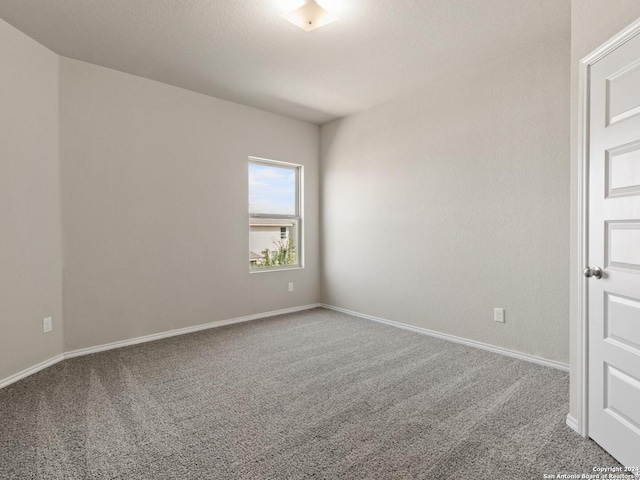 empty room featuring carpet