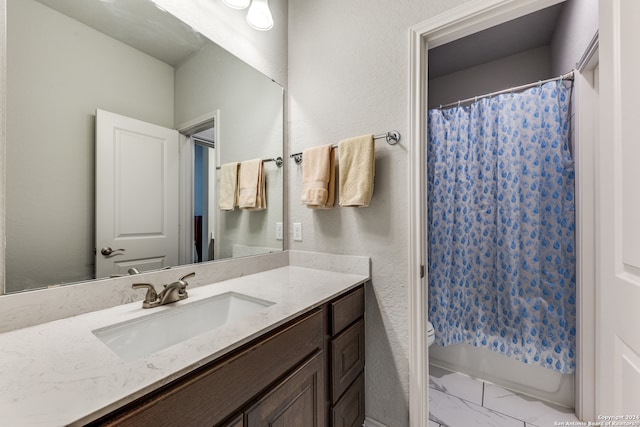 full bathroom featuring vanity, toilet, and shower / bathtub combination with curtain