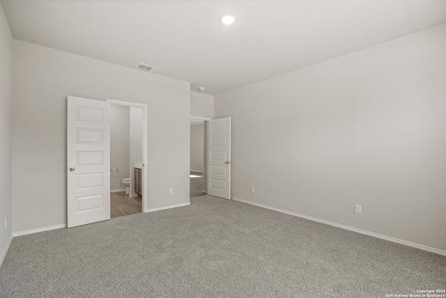 4951 Sandstone Way, San Antonio, TX 78222 - unfurnished bedroom with carpet and ensuite bath