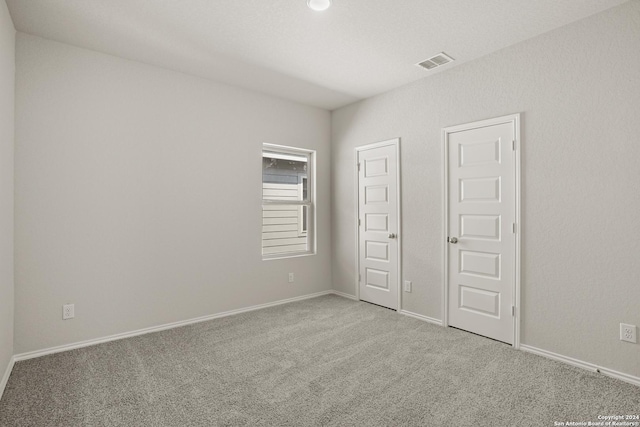 4951 Sandstone Way, San Antonio, TX 78222 - unfurnished bedroom with carpet and baseboards