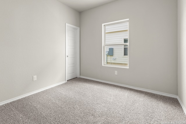 empty room featuring carpet flooring