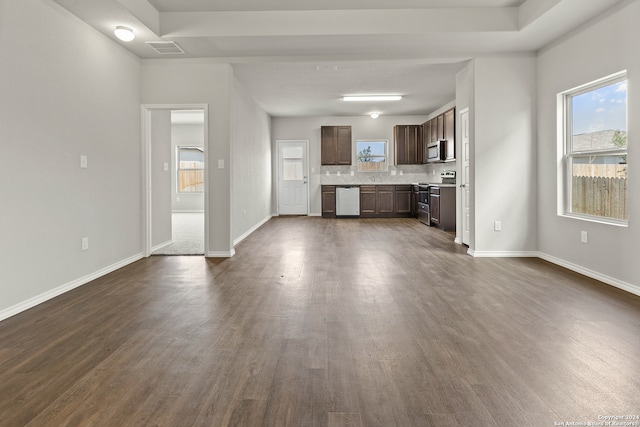 unfurnished living room featuring dark hardwood / wood-style floors