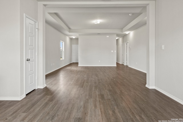 unfurnished room featuring dark hardwood / wood-style floors