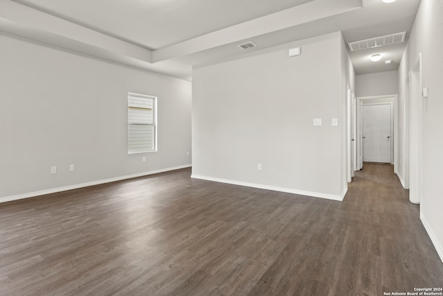 empty room featuring dark hardwood / wood-style floors