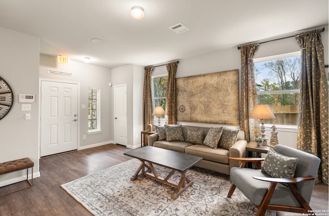 living room featuring dark hardwood / wood-style floors