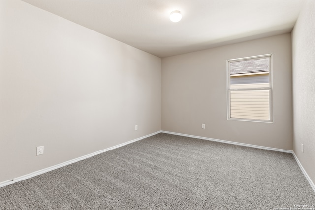 unfurnished room featuring carpet floors