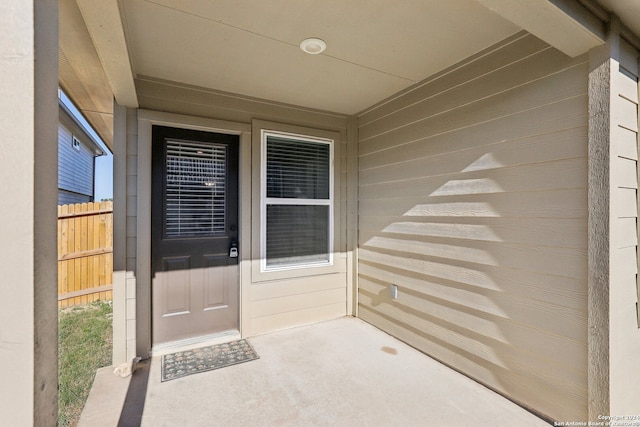 property entrance with a patio