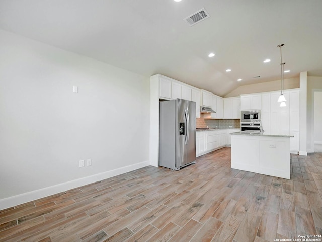 kitchen featuring white cabinets, hanging light fixtures, a kitchen island with sink, extractor fan, and stainless steel appliances