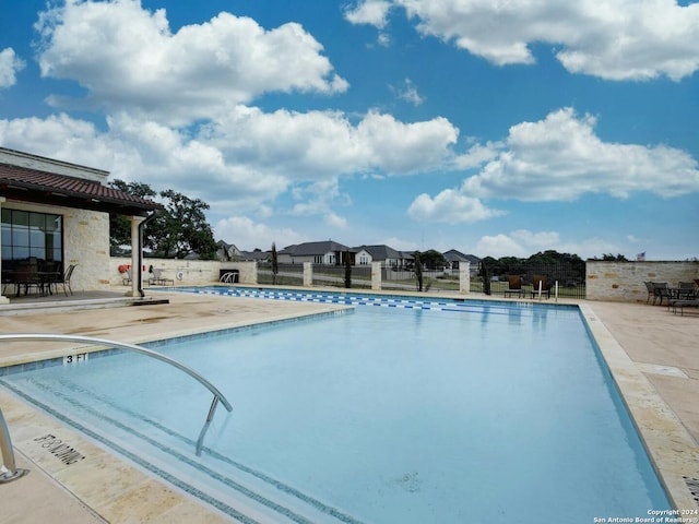 view of pool with a patio