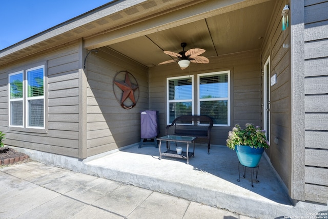 property entrance featuring a patio and ceiling fan