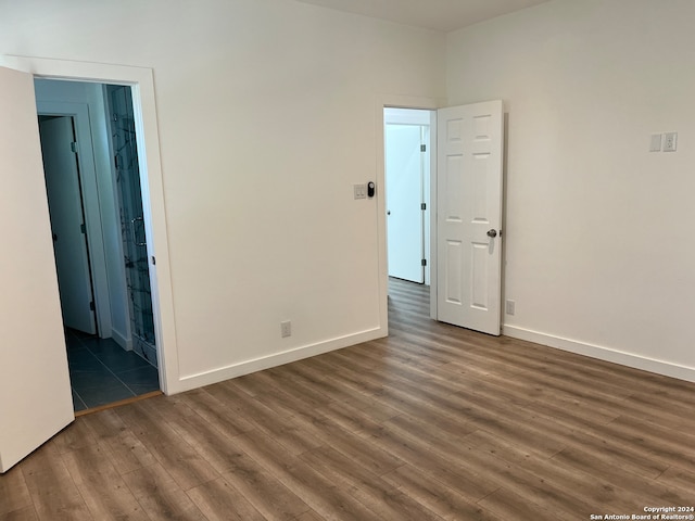 empty room featuring dark hardwood / wood-style floors