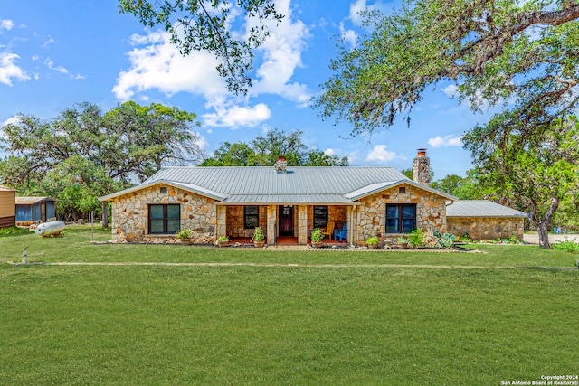 single story home with a front yard