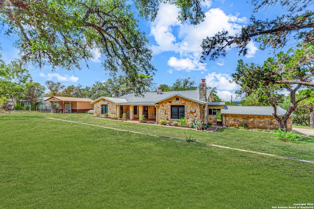 ranch-style house with a front lawn