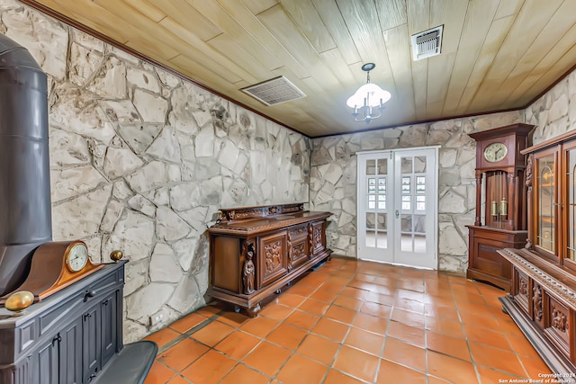 interior space with french doors, tile patterned floors, and wood ceiling