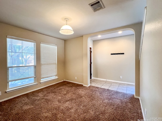 empty room with carpet floors