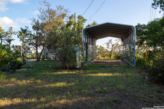 view of yard with a carport