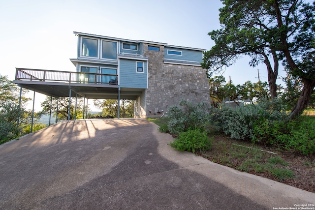 view of front of property with a carport