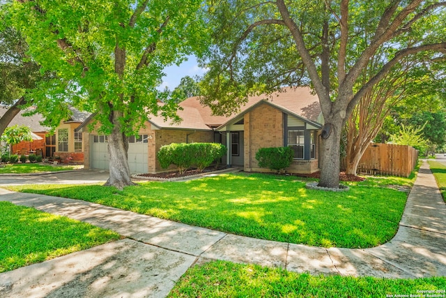 single story home with a front yard