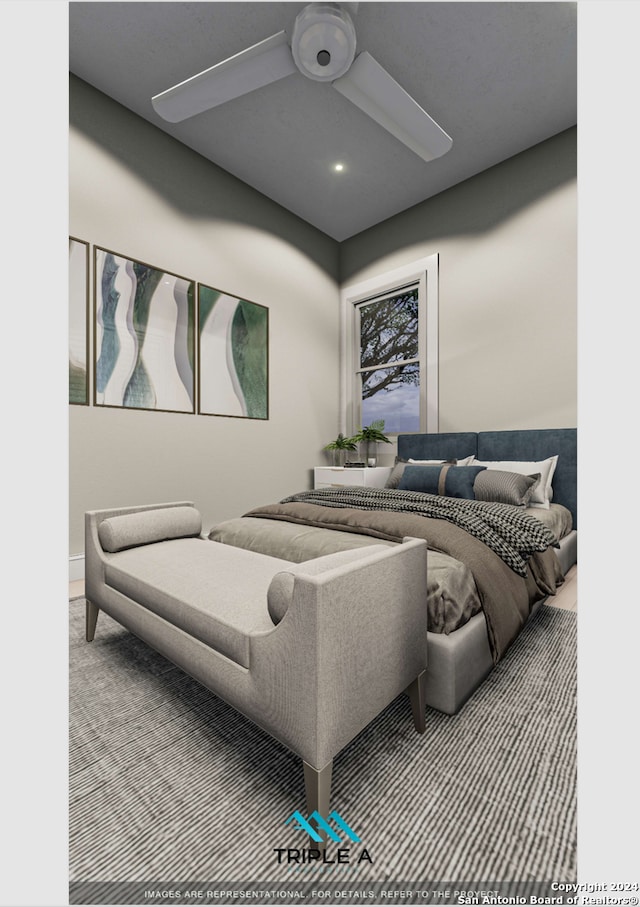 bedroom featuring ceiling fan and carpet flooring