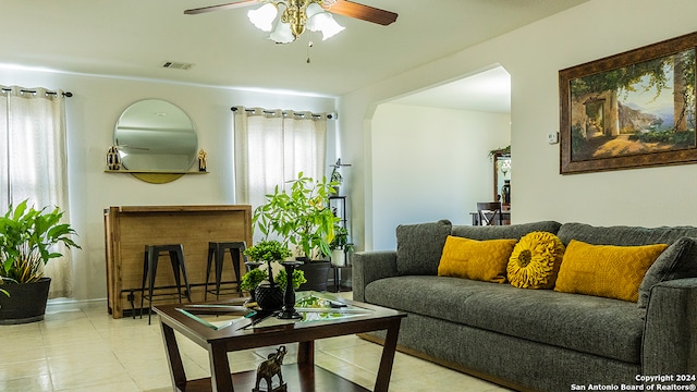 living room featuring ceiling fan