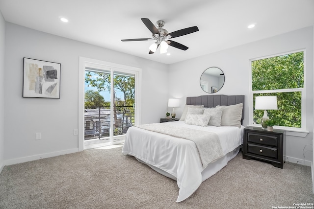 carpeted bedroom with ceiling fan and access to exterior