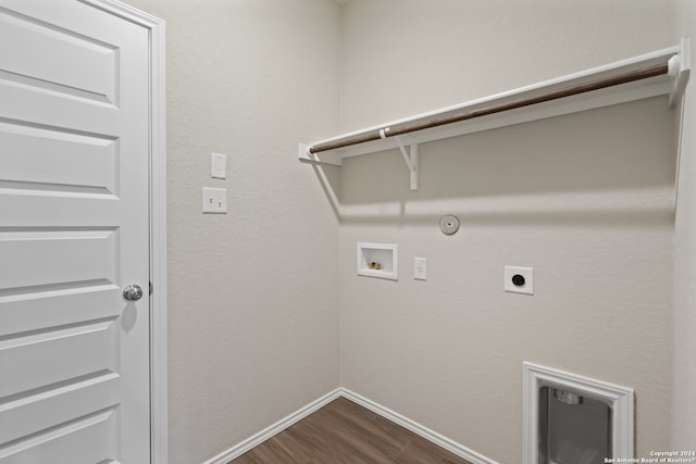 laundry area featuring gas dryer hookup, washer hookup, hardwood / wood-style floors, and electric dryer hookup