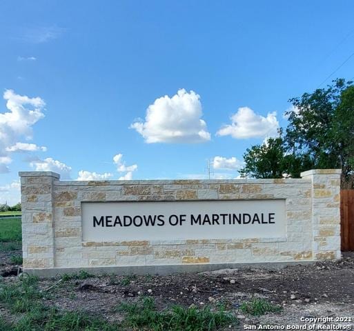 view of community sign