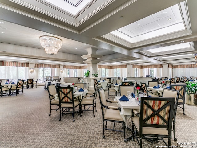 dining room featuring beam ceiling, coffered ceiling, light colored carpet, an inviting chandelier, and crown molding