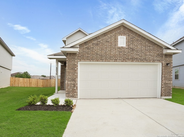 front of property with a garage and a front yard