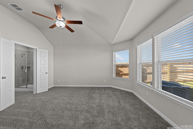 interior space featuring ceiling fan and vaulted ceiling