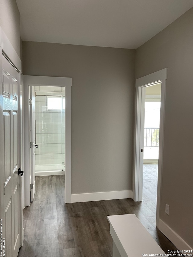 empty room featuring dark hardwood / wood-style flooring