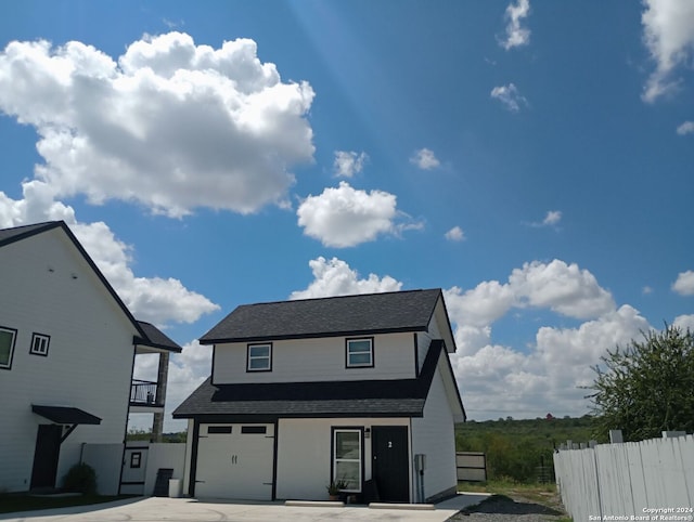 view of front of home with a garage