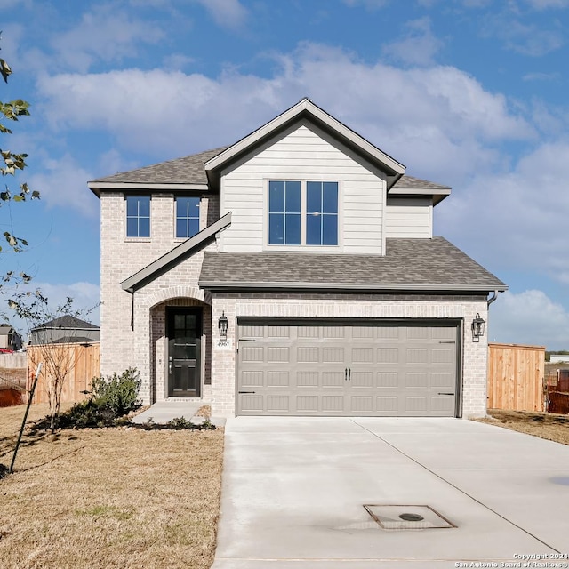 view of property with a garage