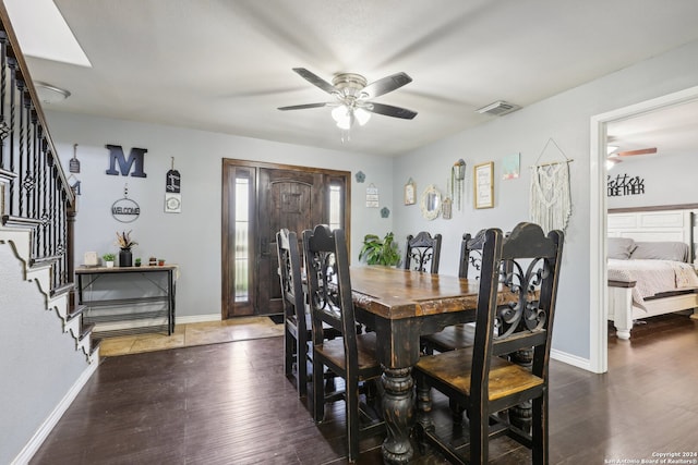 dining area with dark hardwood / wood-style floors and ceiling fan